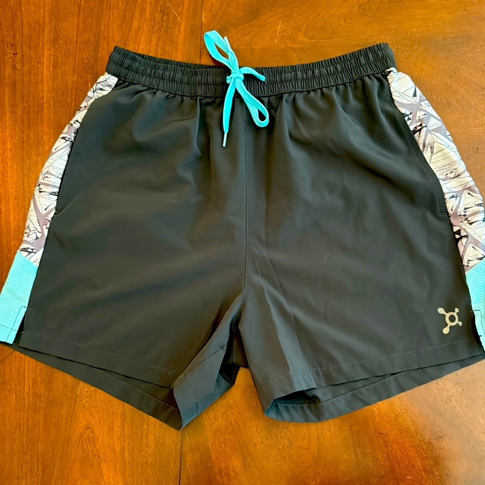 Orange Theory Running Shorts

Rare Multi Color

Brand New